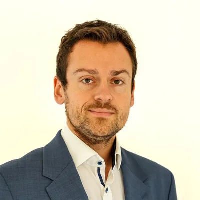 Dr. Florian Delas