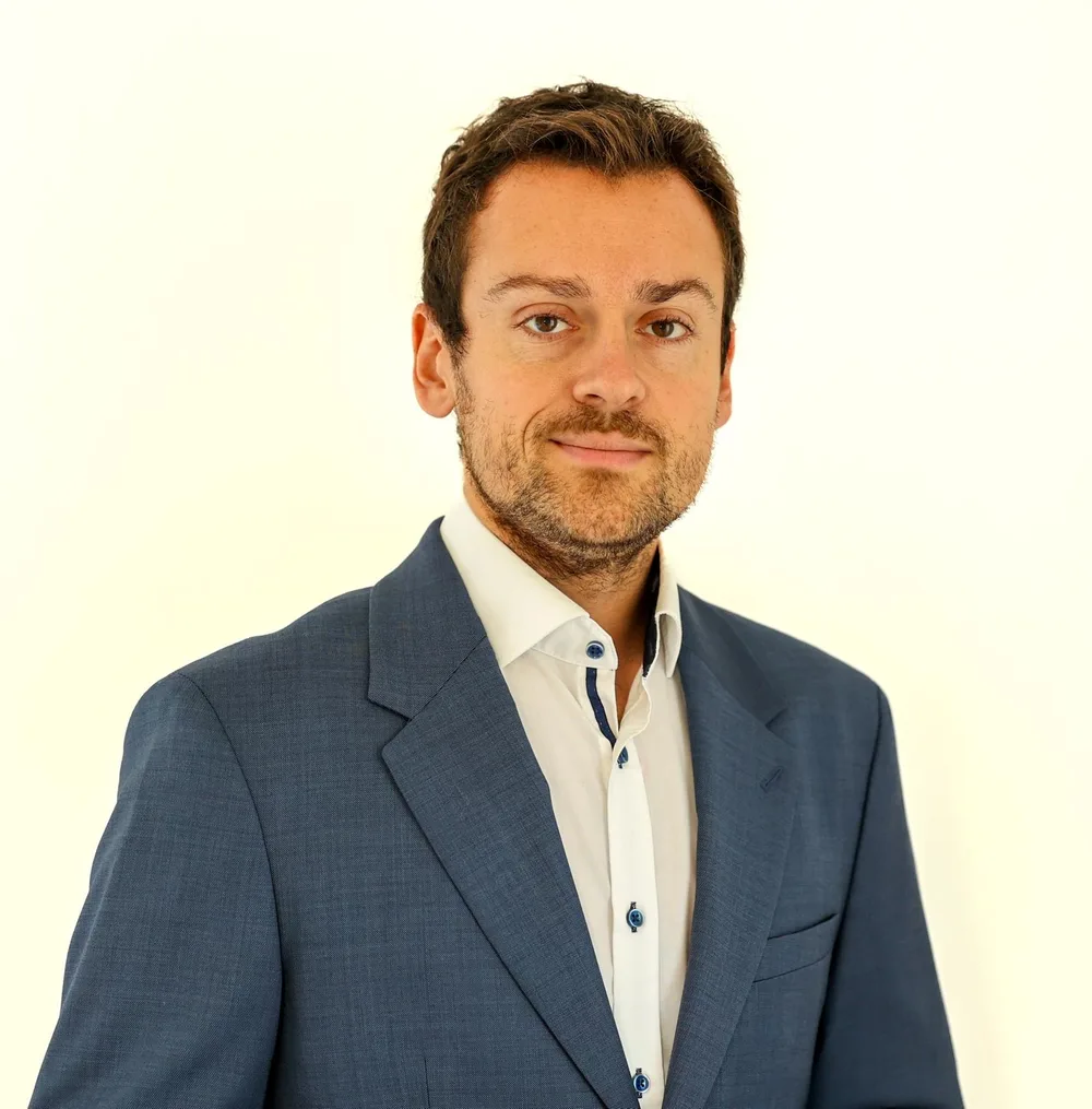 Dr. Florian Delas